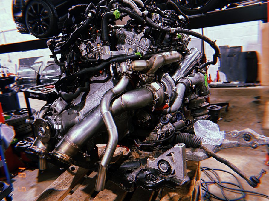 1500hp Nissan R35 GT-R engine with a custom Garrett turbo setup, fabricated in-house and sat on a stand